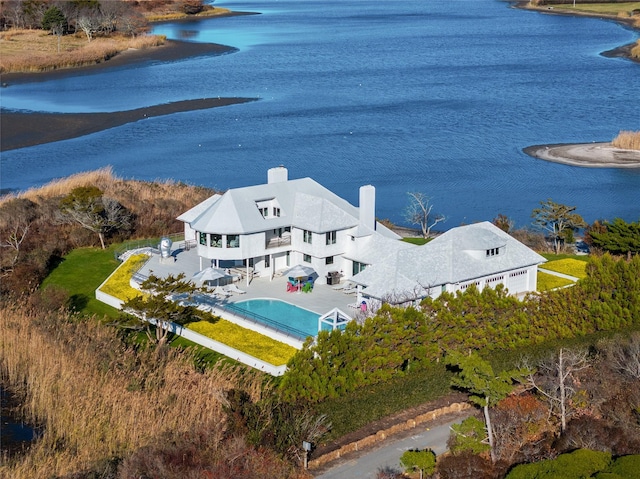 drone / aerial view with a water view