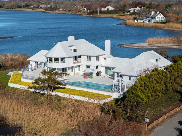 drone / aerial view with a water view