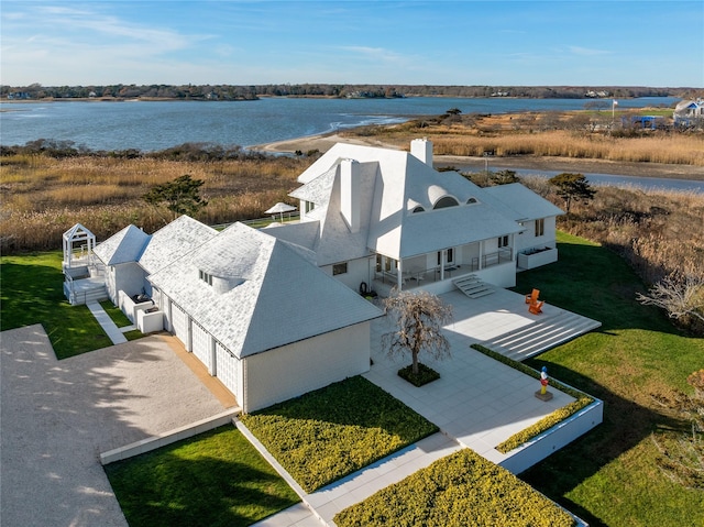 bird's eye view with a water view