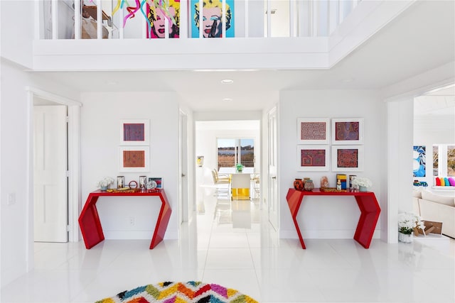 hallway featuring light tile patterned floors