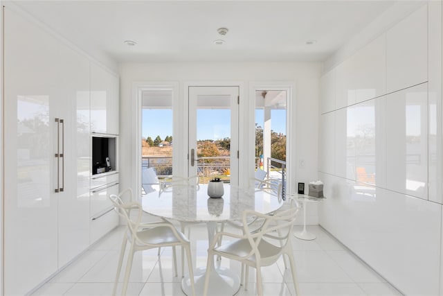 dining room featuring light tile patterned floors