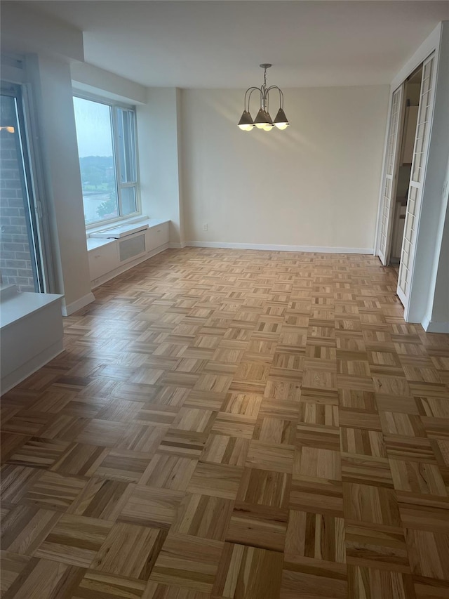 166-25 Powells Cove Blvd Unit 16M, Beechhurst, NY 11357 - unfurnished room with a chandelier