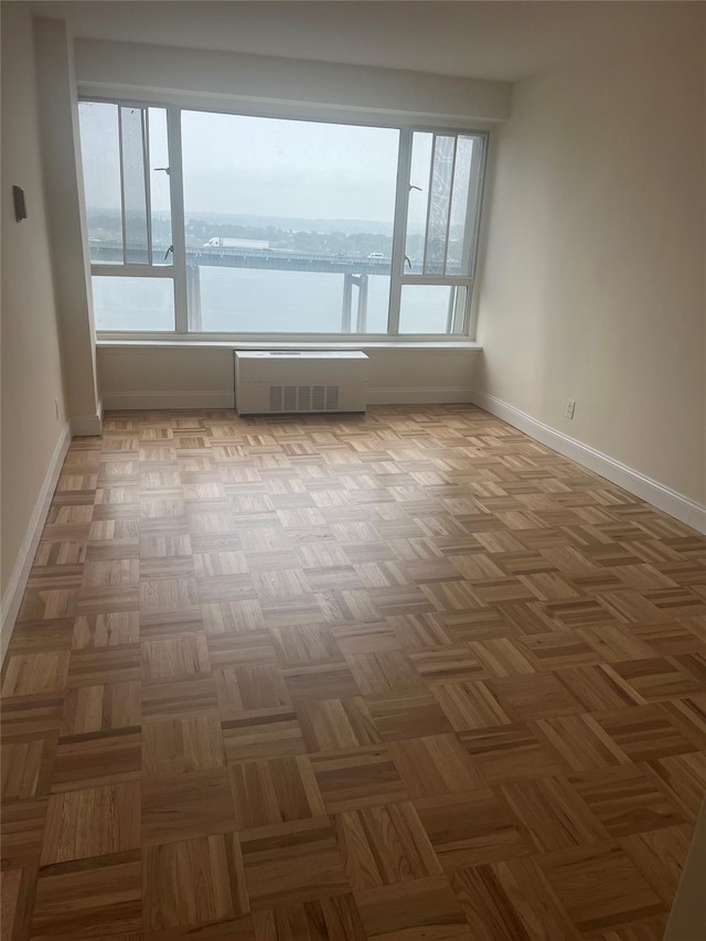 166-25 Powells Cove Blvd Unit 16M, Beechhurst, NY 11357 - unfurnished room with baseboards