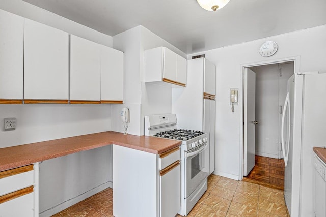 166-25 Powells Cove Blvd Unit 16M, Beechhurst, NY 11357 - kitchen with white appliances and white cabinets