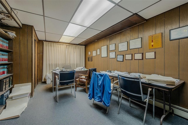 office with a drop ceiling and baseboard heating