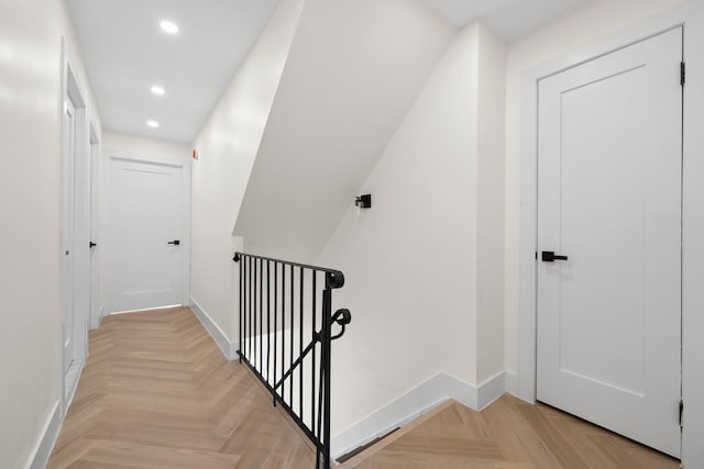 hallway with light parquet floors