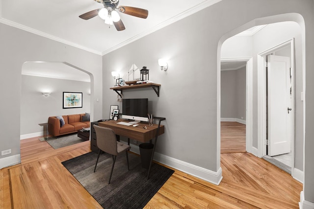 office featuring wood-type flooring, ceiling fan, and ornamental molding