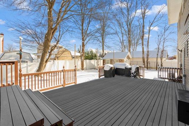 view of snow covered deck