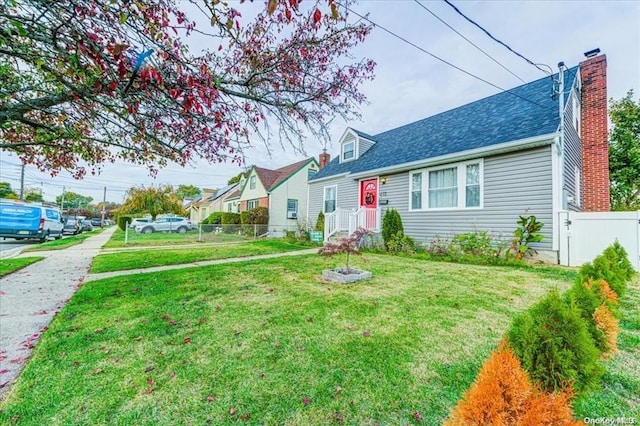 view of front of home featuring a front lawn