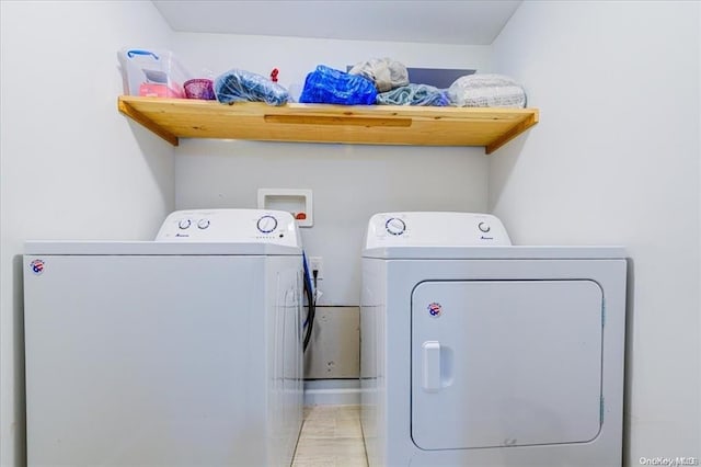 laundry room with washer and dryer