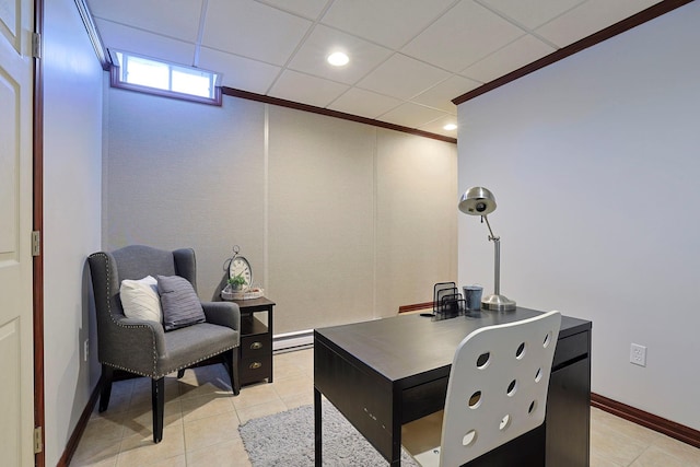 office space with light tile patterned flooring and a drop ceiling