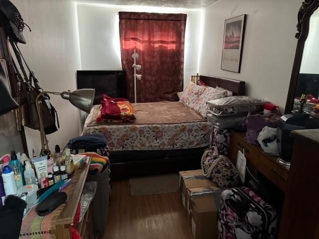 bedroom featuring light hardwood / wood-style floors