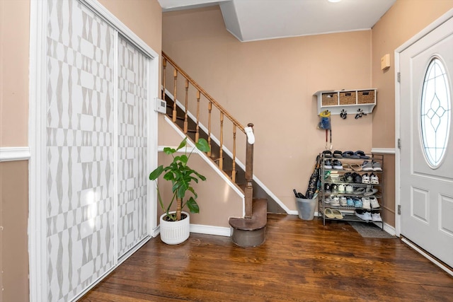 foyer entrance featuring dark hardwood / wood-style flooring