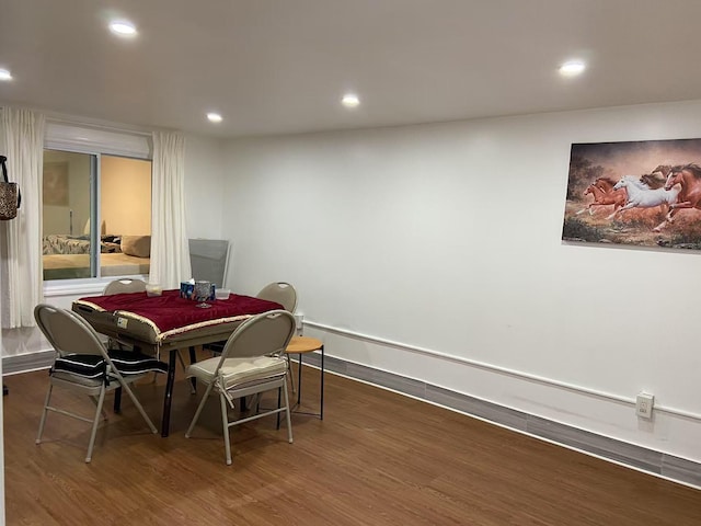 dining room featuring dark hardwood / wood-style flooring