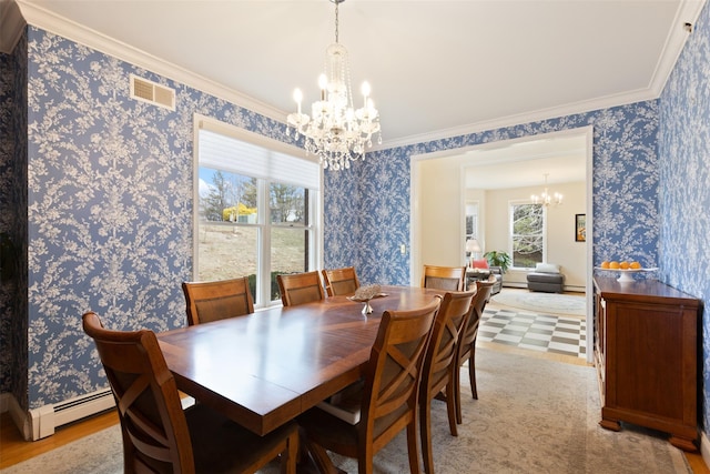 dining room with a notable chandelier, visible vents, wallpapered walls, and a baseboard radiator