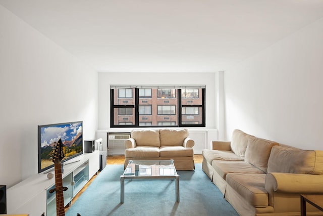 carpeted living room with a wall mounted air conditioner