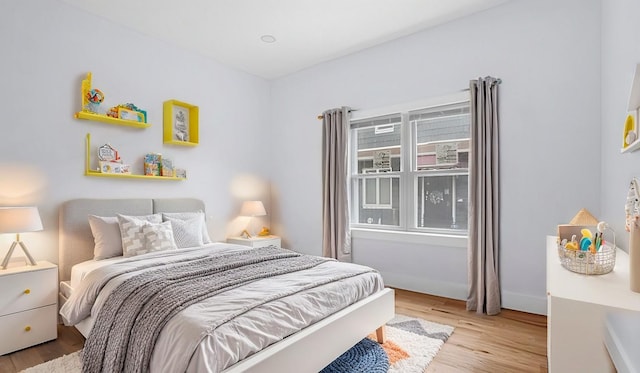 bedroom featuring light hardwood / wood-style floors