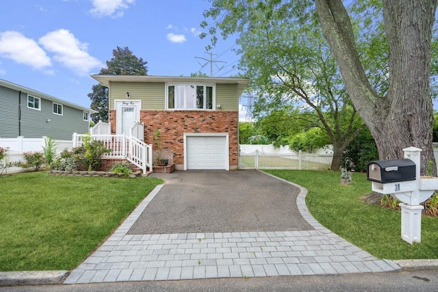 view of front facade with a garage and a front yard