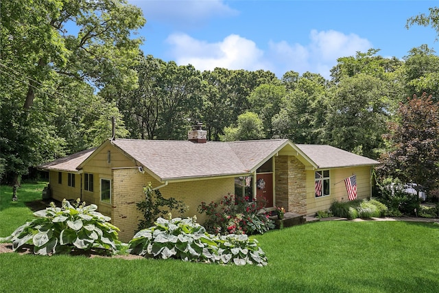 ranch-style house with a front yard