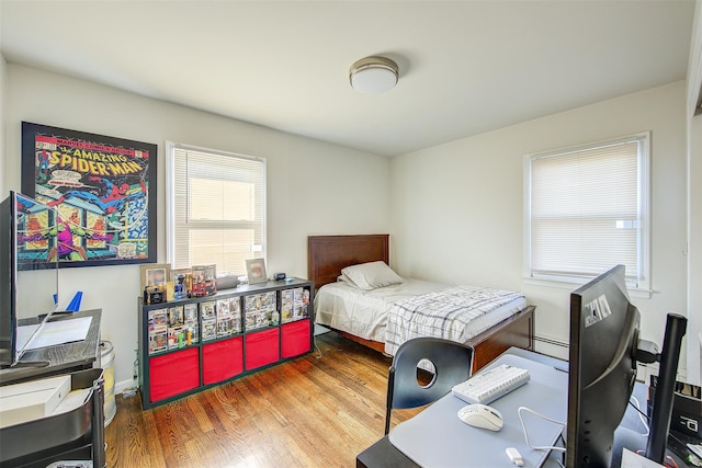 bedroom featuring dark wood-type flooring