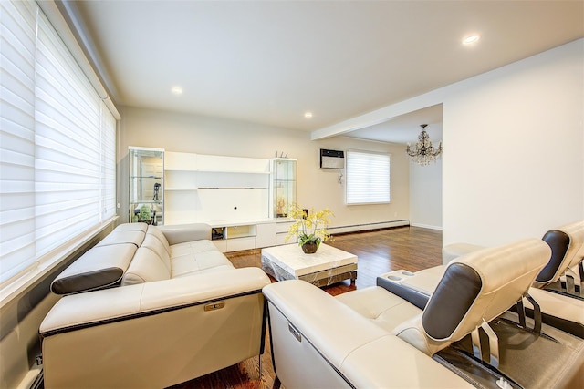 living room featuring a wall mounted air conditioner, dark hardwood / wood-style flooring, a baseboard radiator, and a notable chandelier