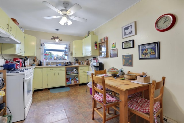 kitchen with ceiling fan, sink, and white range with gas cooktop