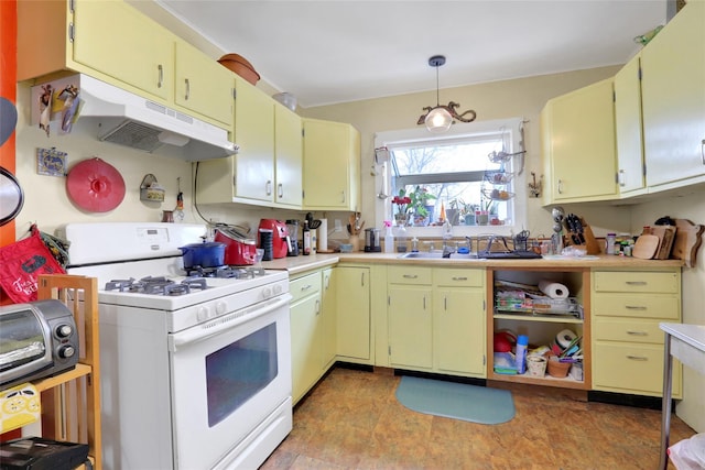 kitchen with decorative light fixtures and gas range gas stove