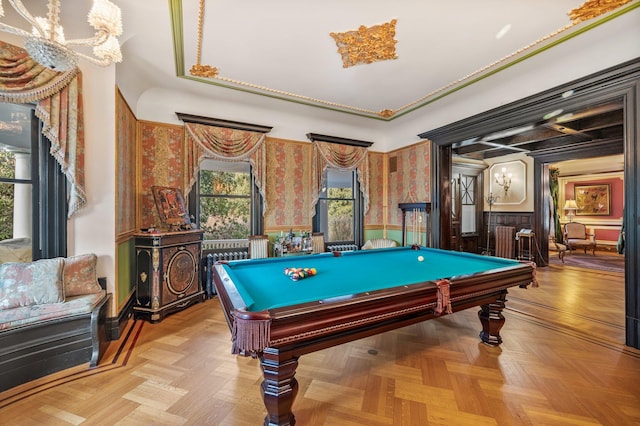 game room featuring light parquet floors, pool table, and a chandelier