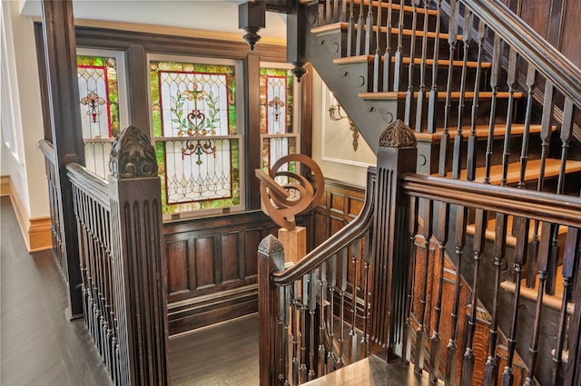 stairs featuring hardwood / wood-style flooring