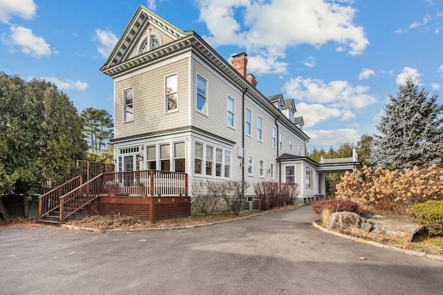 view of front of home with a wooden deck