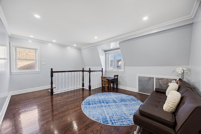 sitting room with dark hardwood / wood-style floors and ornamental molding