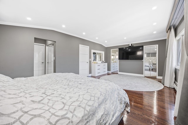 bedroom with crown molding, lofted ceiling, and hardwood / wood-style flooring