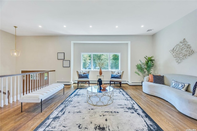 living room with light hardwood / wood-style floors