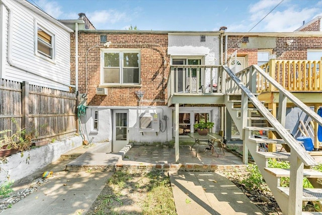 rear view of property with a patio