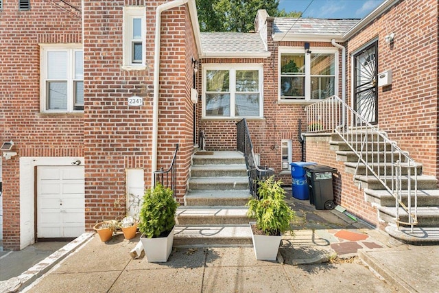 entrance to property featuring a garage