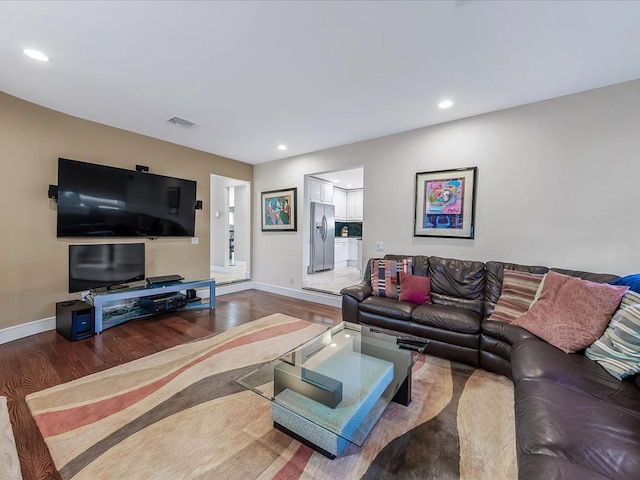 living room with hardwood / wood-style flooring