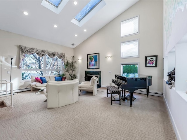 carpeted living room featuring baseboard heating and a towering ceiling