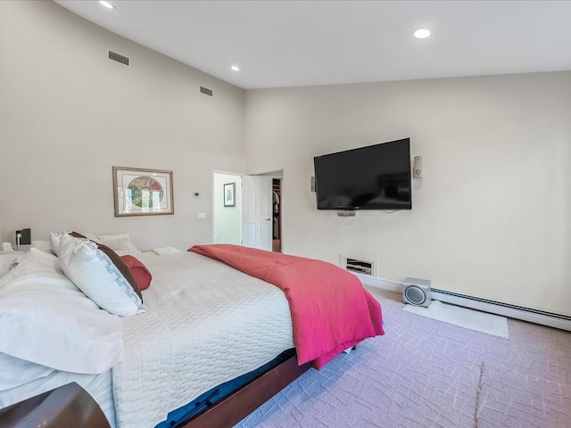 carpeted bedroom with vaulted ceiling