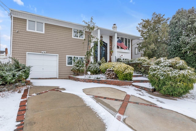 view of front of house with a garage