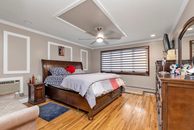 bedroom with a wall mounted air conditioner, ceiling fan, ornamental molding, and light hardwood / wood-style flooring