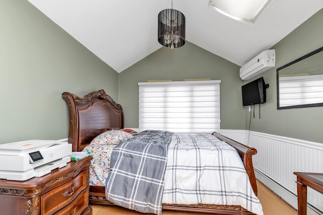 bedroom with vaulted ceiling, light hardwood / wood-style floors, a baseboard radiator, and a wall mounted AC