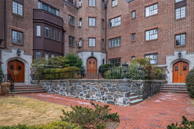 exterior space featuring brick siding