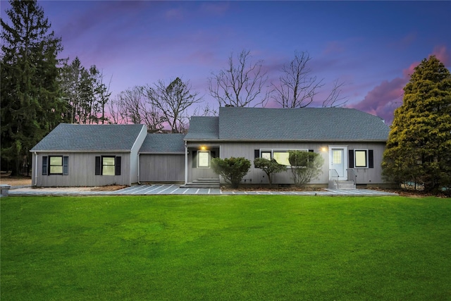 view of front of home featuring a yard