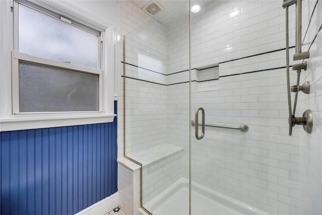 bathroom with an enclosed shower