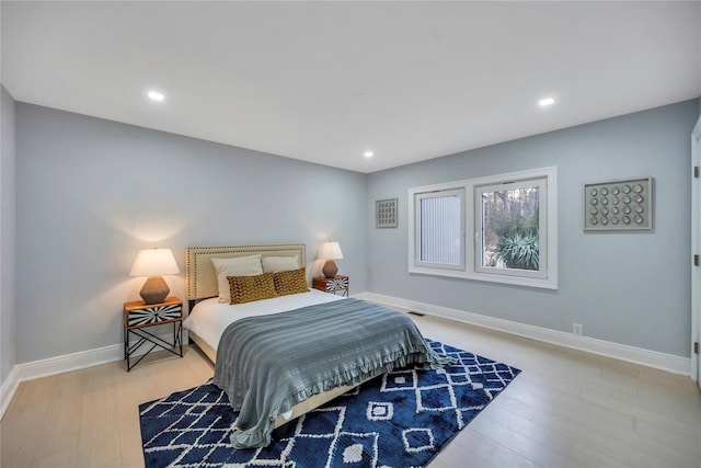 bedroom featuring light hardwood / wood-style flooring