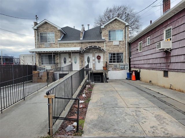 view of front of house with cooling unit