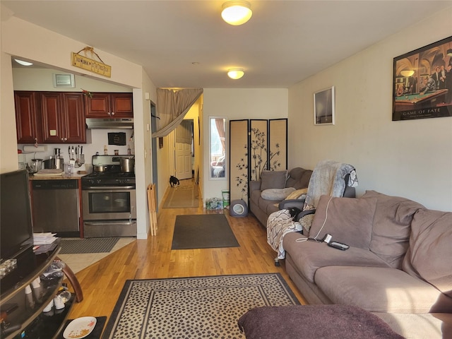 living room with light hardwood / wood-style floors