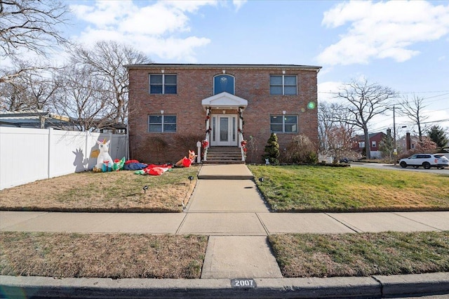 view of front of property with a front lawn