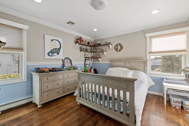 bedroom featuring visible vents, crown molding, a baseboard heating unit, dark wood finished floors, and recessed lighting