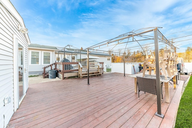 wooden deck featuring a gazebo